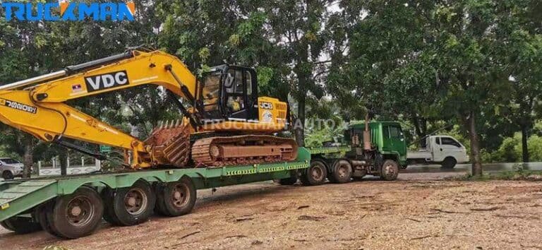 Transport of forestry machinery by low-bed trucks