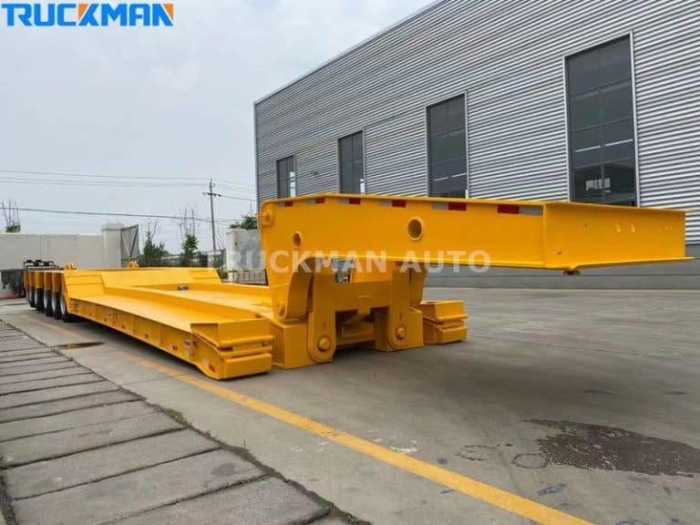 TRUCKMAN's yellow low bed trailer being prepared for shipment to a customer.