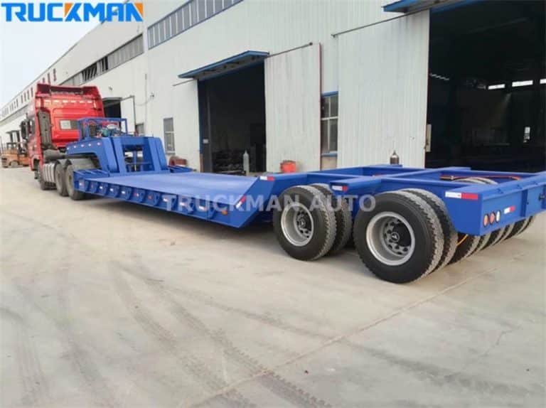TRUCKMAN low bed semi-trailer coupled with a truck