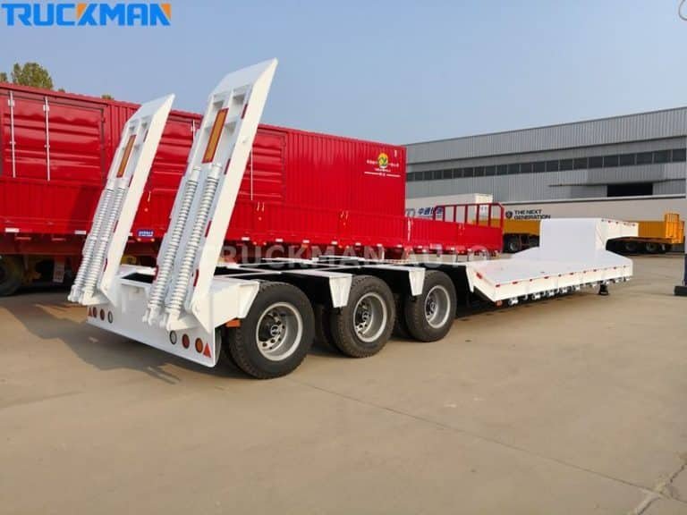 Low-bed semi-trailer with lifting tailgate, ready for loading work