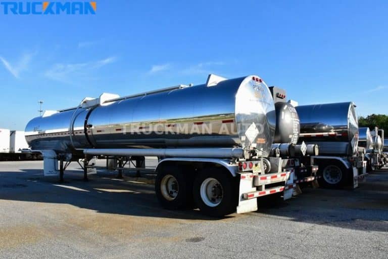 Close-up of safety features on TRUCKMAN tank trailers, including subsea and spill prevention valves, to ensure safe petroleum transport.