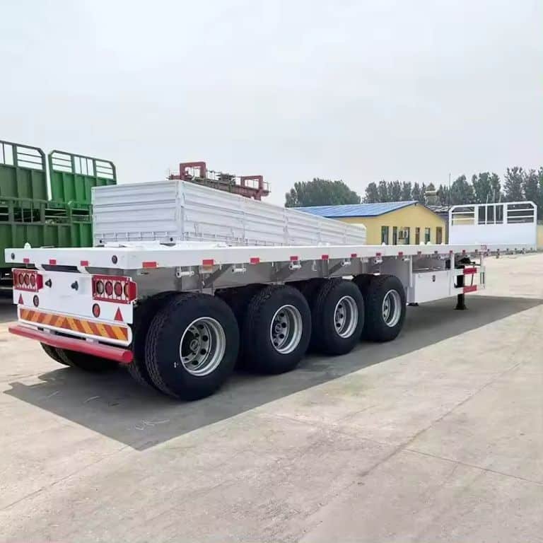 Flatbed semi-trailer container with side stakes for secure cargo hauling, illustrating standard width and length