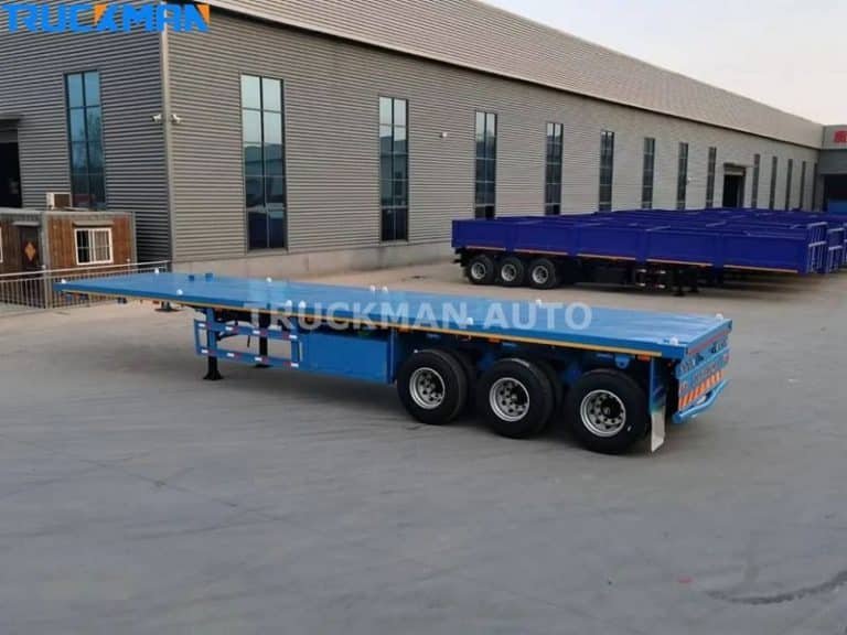 Blue flatbed container semi-trailer ready for loading at the transport logistics center