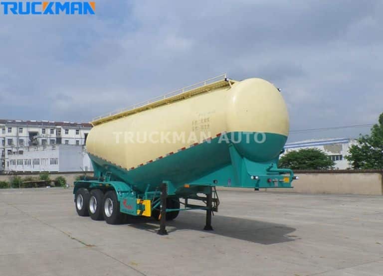 Cement tanker semi-trailer on display outdoors, suitable for medium to large scale projects.